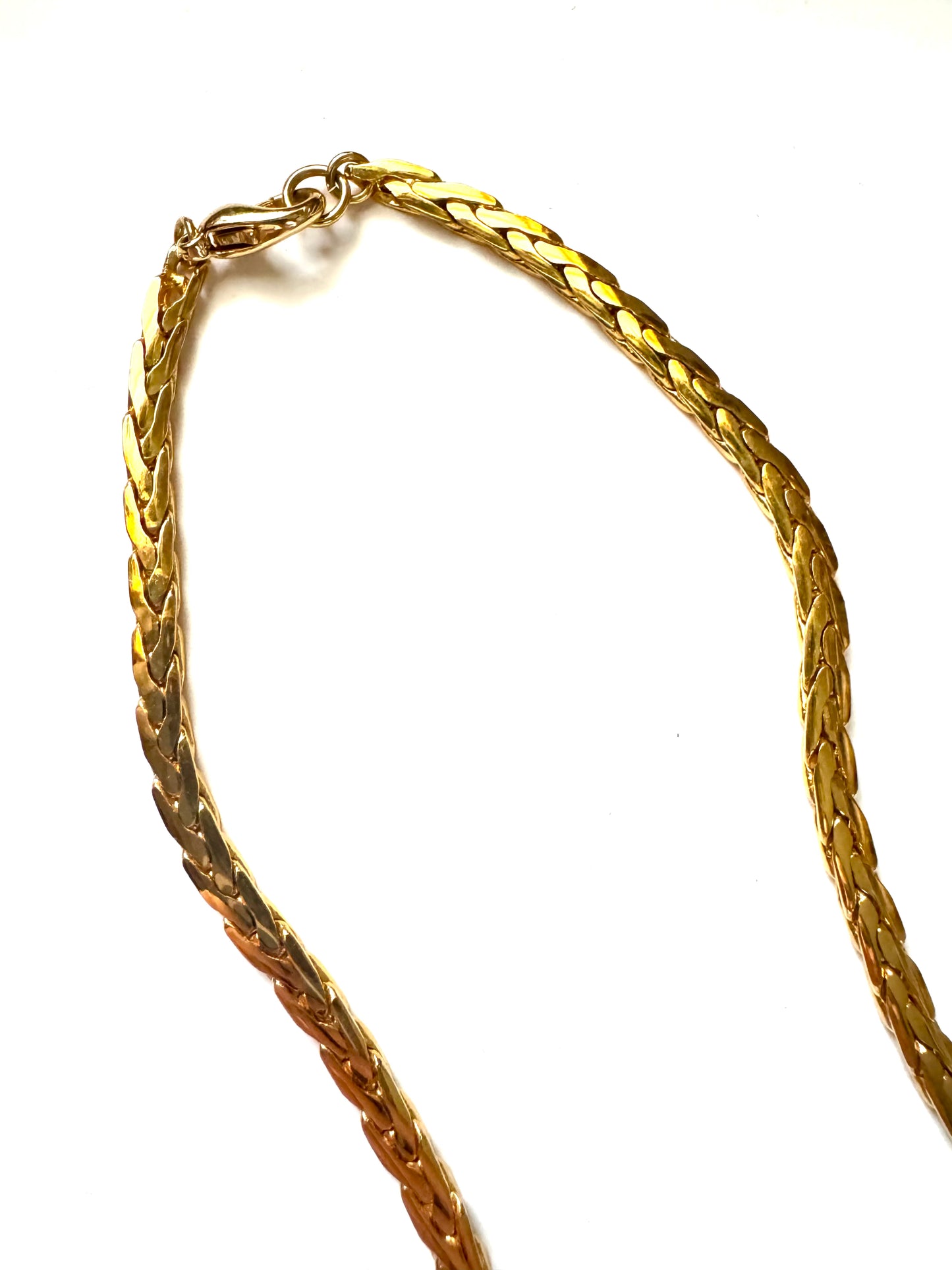 Vintage Nolan Miller Gold-Tone Pendant Necklace with Sculptural Knot Motif & Blue Stone